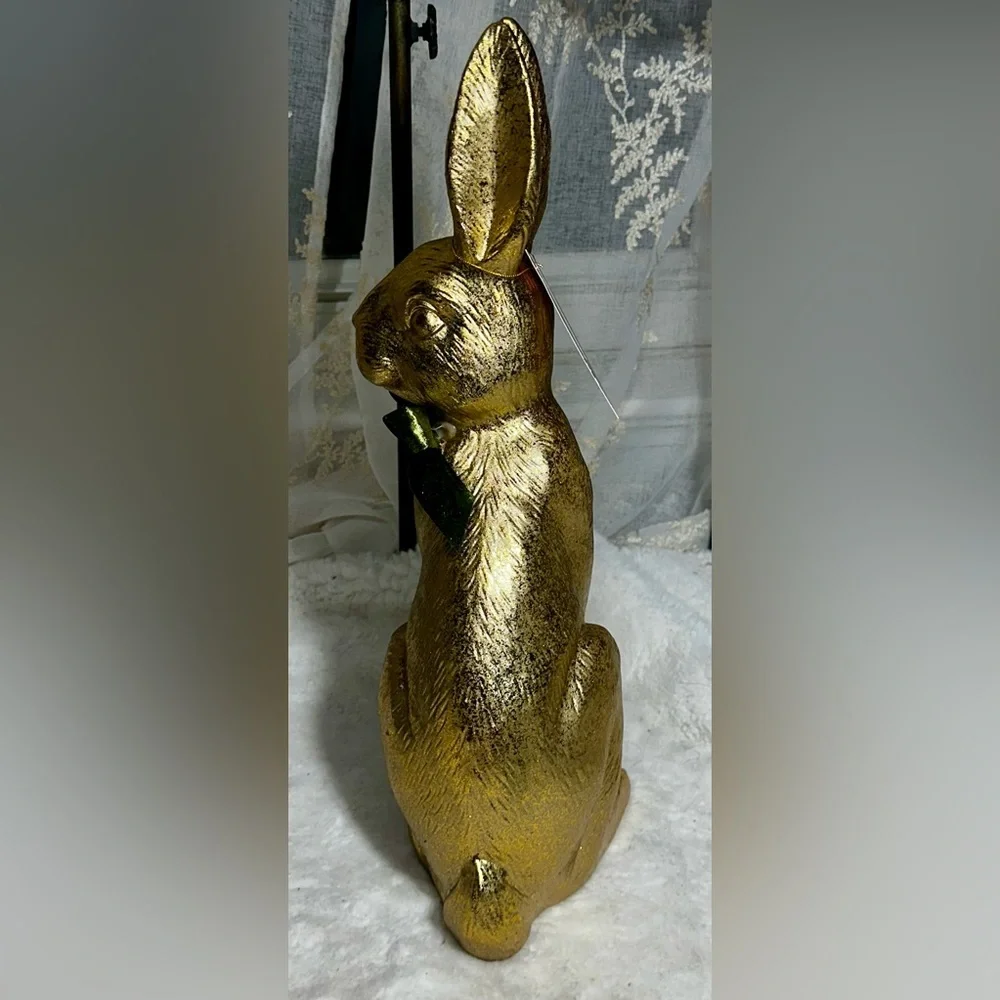 Jolie Fleur gold rabbit with forest green bow decor